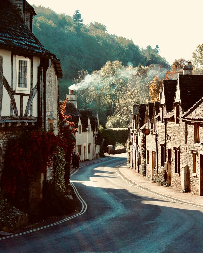 Village lane climbing between old houses